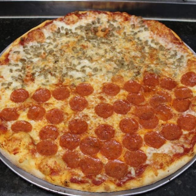 $2 OFF Any Giant 24” Pizza Special.