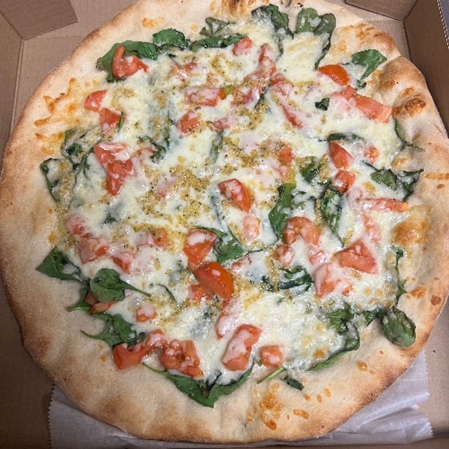 White with Spinach, Garlic & Tomato Stromboli.